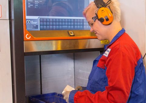 Vahterus worker retrieves needed tools and parts from automated warehouse Agilon